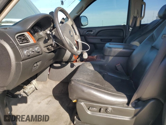 2010 Chevrolet Suburban LTZ with VIN 1GNUKKE37AR165641, listed as a Copart auction lot 88939935 with 203,190 mi miles and Salvage title. Bid and sale history available at DreamBid. Image 7.