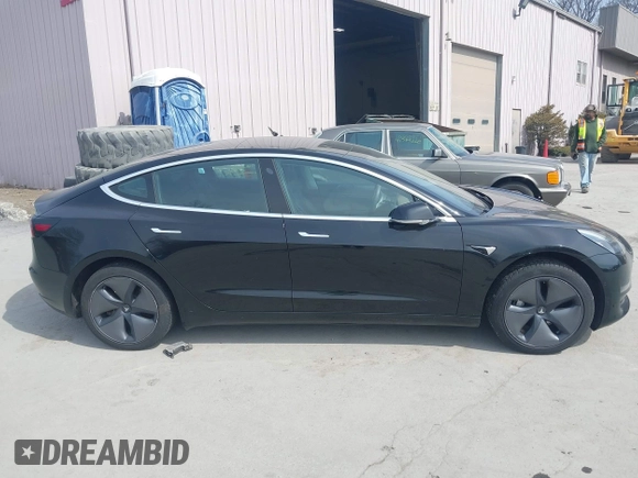2020 Tesla Model 3 Standard Range Plus with VIN 5YJ3E1EAXLF643807, listed as a IAAI auction lot 41789406 with 49,256 mi miles. Bid and sale history available at carsss.com. Image 12.
