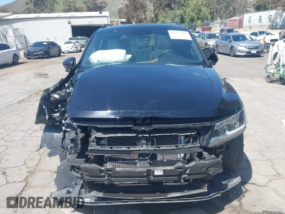 2021 Volkswagen Tiguan SE with VIN 3VV3B7AX0MM015825, listed as a IAAI auction lot 41955268 with 57,909 mi miles and . Bid and sale history available at DreamBid. Image 12.
