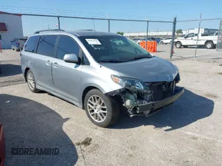 2011 Toyota Sienna SE with VIN 5TDXK3DC8BS131434, listed as a IAAI auction lot 42002675 with 209,396 mi miles. Bid and sale history available at carsss.com. Image 1.