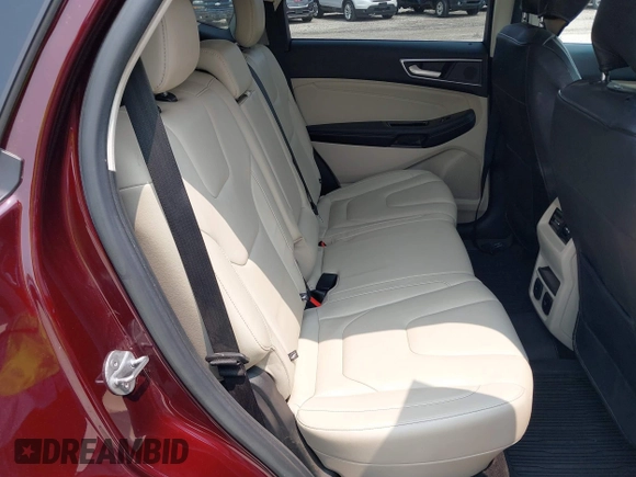 2019 Ford Edge Titanium with VIN 2FMPK4K96KBB20247, listed as a IAAI auction lot 42450212 with 121,756 mi miles and . Bid and sale history available at DreamBid. Image 8.