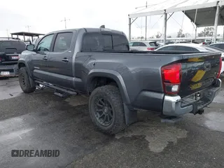 2022 Toyota Tacoma SR5 with VIN 3TMBZ5DN2NM034561, listed as a IAAI auction lot 40867443 with 51,728 mi miles and . Bid and sale history available at DreamBid. Image 3.