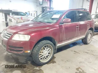 2004 Volkswagen Touareg z VIN WVGCM67LX4D038012, wystawiony jako IAAI lot #41285460 z przebiegiem Nie podano mil oraz . Historia ofert i sprzedaży dostępna na DreamBid. Obrazek 17.