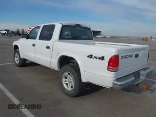 2004 Dodge Dakota SLT with VIN 1D7HG48N44S524998, listed as a IAAI auction lot 42195420 with 197,530 mi miles and . Bid and sale history available at DreamBid. Image 3.