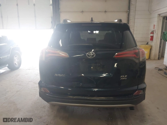 2017 Toyota RAV4 XLE with VIN JTMRFREV6HD208421, listed as a IAAI auction lot 42078130 with 228,365 mi miles. Bid and sale history available at carsss.com. Image 16.
