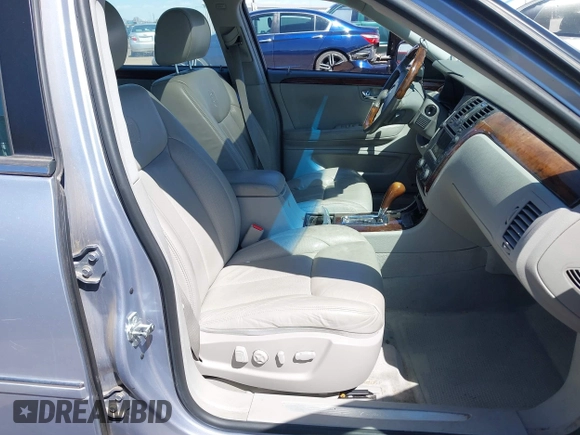 2006 Cadillac DTS w/1SE with VIN 1G6KD57956U188369, listed as a IAAI auction lot 41837341 with 115,417 mi miles. Bid and sale history available at carsss.com. Image 5.