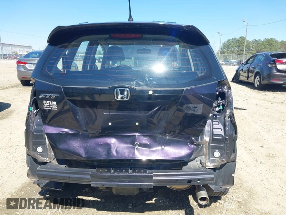 2013 Honda Fit Sport with VIN JHMGE8H59DC001939, listed as a IAAI auction lot 41885102 with 113,639 mi miles. Bid and sale history available at carsss.com. Image 6.