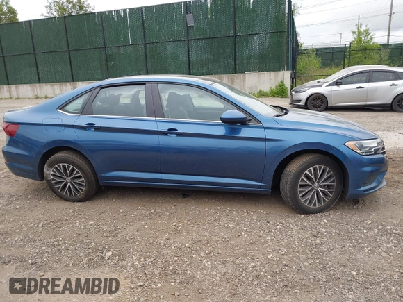 2021 Volkswagen Jetta S z VIN 3VWC57BU1MM070677, wystawiony jako IAAI lot #42312226 z przebiegiem 53 808 mil mil oraz . Historia ofert i sprzedaży dostępna na DreamBid. Obrazek 13.