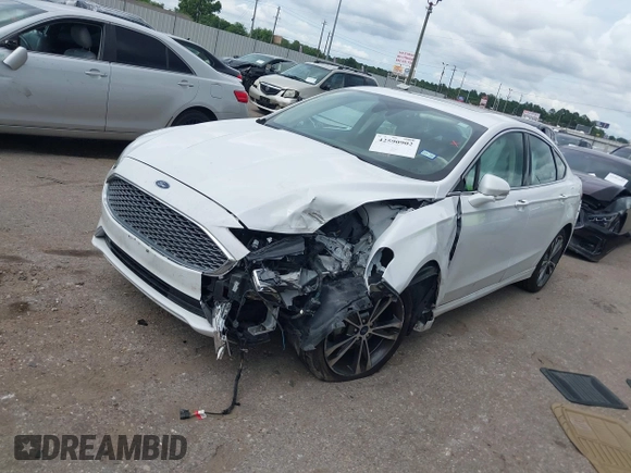 2020 Ford Fusion Titanium с VIN 3FA6P0D98LR151810, выставлен на аукционе IAAI как лот 42590902 с пробегом 76 624 миль миль и . История ставок и продаж доступна на DreamBid. Изображение 17.