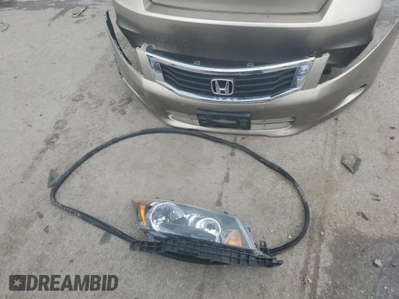 2010 Honda Accord EX-L z VIN 5KBCP3F88AB005880, wystawiony jako Copart lot #56700915 z przebiegiem 133 254 mil mil oraz Szkoda całkowita • Salvage title. Historia ofert i sprzedaży dostępna na DreamBid. Obrazek 12.