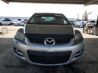 2009 Mazda CX-7 Grand Touring z VIN JM3ER29L990226899, wystawiony jako Copart lot #50071505 z przebiegiem 167 124 mil mil oraz Szkoda całkowita • Salvage title. Historia ofert i sprzedaży dostępna na DreamBid. Obrazek 5.