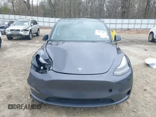 2023 Tesla Model Y Long Range with VIN 7SAYGDEE3PA177437, listed as a IAAI auction lot 41813483 with 17,093 mi miles. Bid and sale history available at carsss.com. Image 13.