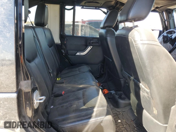 2013 Jeep Wrangler Unlimited Rubicon with VIN 1C4BJWFG2DL533839, listed as a Copart auction lot 88917985 with 112,673 mi miles and Salvage Title. Bid and sale history available at carsss.com. Image 11.