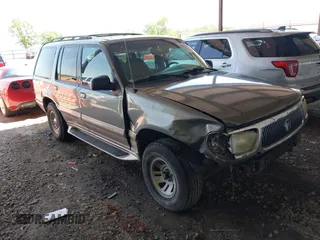 2000 Mercury Mountaineer z VIN 4M2ZU66P0YUJ13268, wystawiony jako IAAI lot #42271864 z przebiegiem 243 104 mil mil oraz . Historia ofert i sprzedaży dostępna na DreamBid. Obrazek 1.