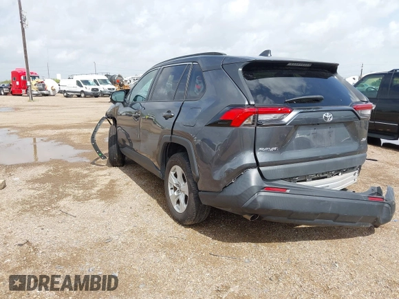 2021 Toyota RAV4 XLE with VIN 2T3W1RFV5MC104078, listed as a IAAI auction lot 42591343 with 57,057 mi miles and . Bid and sale history available at DreamBid. Image 3.