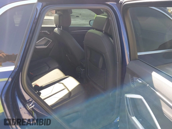 2021 Audi Q3 Premium with VIN WA1AUCF32M1066149, listed as a IAAI auction lot 40695269 with 92,598 mi miles and . Bid and sale history available at DreamBid. Image 8.