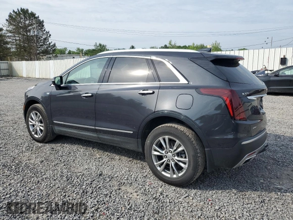 2022 Cadillac XT5 AWD Premium Luxury with VIN 1GYKNDRS9NZ126988, listed as a Copart auction lot 61019965 with 30,189 mi miles and Salvage title. Bid and sale history available at DreamBid. Image 2.