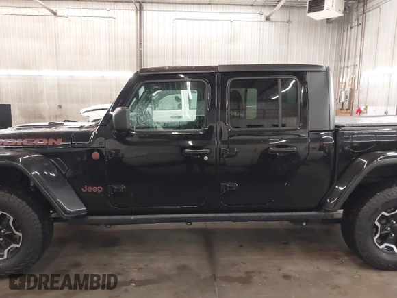 2021 Jeep Gladiator Rubicon with VIN 1C6JJTBGXML529108, listed as a IAAI auction lot 42139924 with 32,204 mi miles and . Bid and sale history available at DreamBid. Image 15.