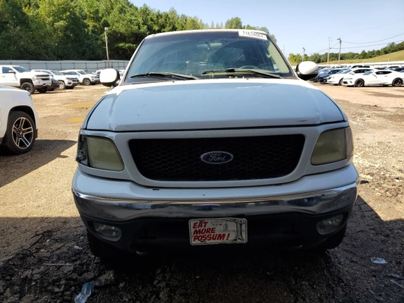 2003 Ford F-150 XLT with VIN 1FTRW08L23KD65857, listed as a Copart auction lot 71634004 with 321,505 mi miles and Clean Title. Bid and sale history available at carsss.com. Image 5.