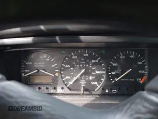 1991 Volkswagen Passat z VIN WVWFB4315ME035691, wystawiony jako IAAI lot #41627396 z przebiegiem 168 795 mil mil oraz . Historia ofert i sprzedaży dostępna na DreamBid. Obrazek 7.