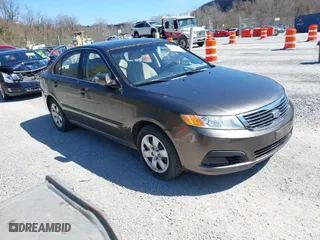 2009 Kia Optima LX with VIN KNAGE228095327297, listed as a IAAI auction lot 41895638 with 170,024 mi miles. Bid and sale history available at carsss.com. Image 1.