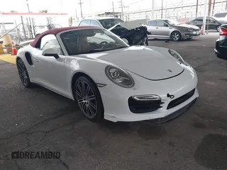2015 Porsche 911 Turbo with VIN WP0CD2A9XFS178490, listed as a IAAI auction lot 41383315 with 14,345 mi miles. Bid and sale history available at carsss.com. Image 1.