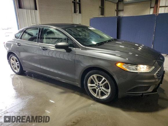 2018 Ford Fusion SE z VIN 3FA6P0H79JR111709, wystawiony jako Copart lot #52972855 z przebiegiem 116 442 mil mil oraz Czysty tytuł • Clean title. Historia ofert i sprzedaży dostępna na DreamBid. Obrazek 4.