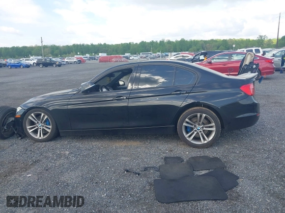 2013 BMW 3 Series 335i xDrive with VIN WBA3B9G54DNR89987, listed as a IAAI auction lot 42159592 with 165,999 mi miles and . Bid and sale history available at DreamBid. Image 14.