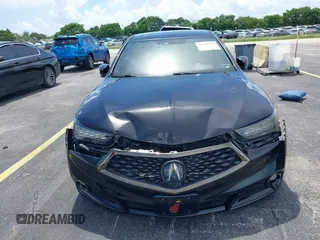 2018 Acura TLX w/A-SPEC Pkg z VIN 19UUB2F65JA002553, wystawiony jako IAAI lot #40023121 z przebiegiem 123 259 mil mil oraz . Historia ofert i sprzedaży dostępna na DreamBid. Obrazek 6.