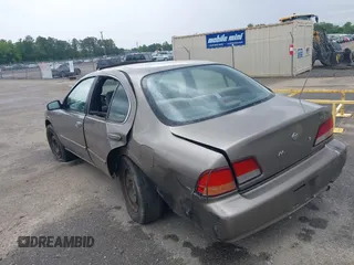 1999 Nissan Maxima GXE z VIN JN1CA21D5XT203484, wystawiony jako IAAI lot #42161696 z przebiegiem 249 747 mil mil oraz . Historia ofert i sprzedaży dostępna na DreamBid. Obrazek 6.