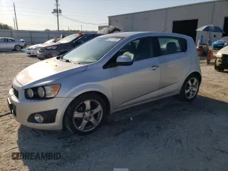 2012 Chevrolet Sonic LTZ z VIN 1G1JE6SH4C4101608, wystawiony jako Copart lot #53111725 z przebiegiem 203 012 mil mil oraz Szkoda całkowita • Salvage title. Historia ofert i sprzedaży dostępna na DreamBid. Obrazek 1.