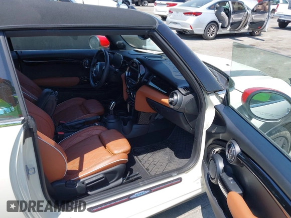 2021 MINI Convertible with VIN WMWWJ9C0XM3M07302, listed as a IAAI auction lot 42027854 with 30,921 mi miles and . Bid and sale history available at DreamBid. Image 5.
