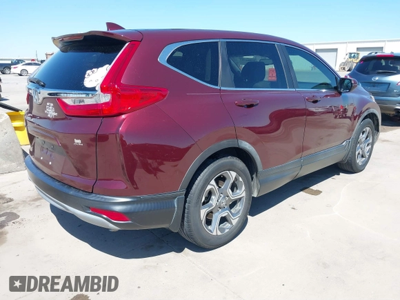 2019 Honda CR-V EX-L with VIN 5J6RW1H85KL002165, listed as a IAAI auction lot 41842267 with 127,466 mi miles. Bid and sale history available at carsss.com. Image 4.
