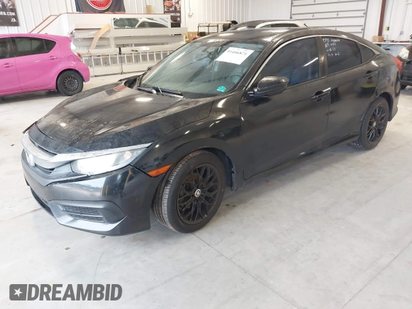 2016 Honda Civic Sedan LX with VIN 19XFC2F59GE017820, listed as a IAAI auction lot 41406871 with 126,376 mi miles. Bid and sale history available at carsss.com. Image 2.