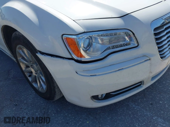 2014 Chrysler 300 with VIN 2C3CCAET6EH173381, listed as a IAAI auction lot 42158270 with 124,551 mi miles. Bid and sale history available at carsss.com. Image 6.