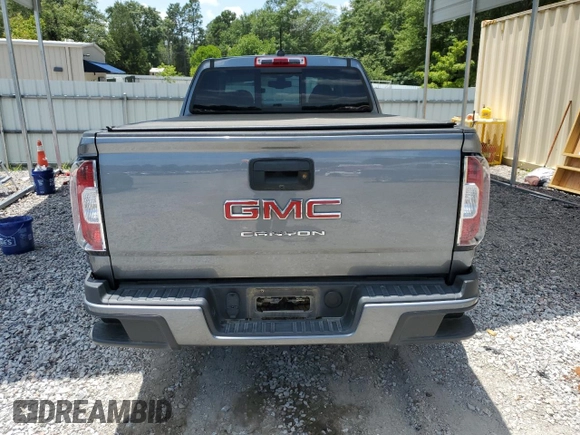 2022 GMC Canyon 2WD SLE with VIN 1GTH5CEA7N1318416, listed as a Copart auction lot 63020814 with 35,304 mi miles and Salvage Title. Bid and sale history available at carsss.com. Image 6.