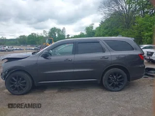 2018 Dodge Durango SXT with VIN 1C4RDJAG7JC116289, listed as a IAAI auction lot 42256051 with 119,579 mi miles and . Bid and sale history available at DreamBid. Image 15.