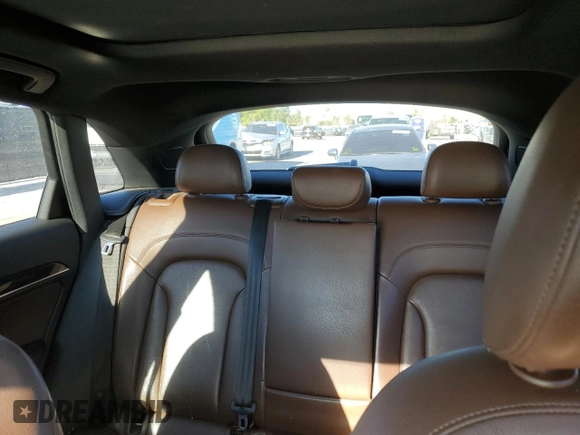 2016 Audi Q3 Prestige z VIN WA1GFCFS8GR001050, wystawiony jako Copart lot #49400595 z przebiegiem 104 091 mil mil oraz Szkoda całkowita • Salvage title. Historia ofert i sprzedaży dostępna na DreamBid. Obrazek 10.