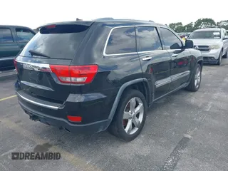 2012 Jeep Grand Cherokee Overland with VIN 1C4RJECT4CC299549, listed as a IAAI auction lot 41917306 with 229,256 mi miles. Bid and sale history available at carsss.com. Image 4.