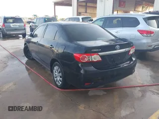 2013 Toyota Corolla L with VIN 2T1BU4EE6DC935978, listed as a IAAI auction lot 42111995 with 200,152 mi miles. Bid and sale history available at carsss.com. Image 3.