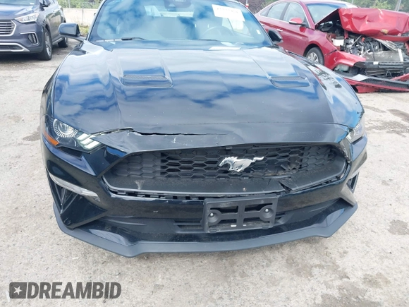 2022 Ford Mustang EcoBoost z VIN 1FATP8UH7N5124631, wystawiony jako IAAI lot #42322481 z przebiegiem 57 502 mil mil oraz . Historia ofert i sprzedaży dostępna na DreamBid. Obrazek 18.