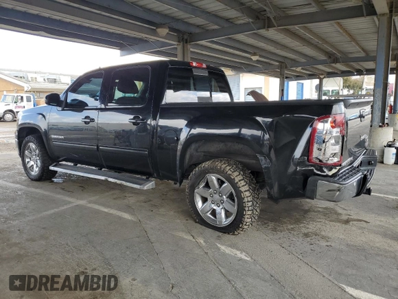 2012 GMC Sierra 1500 with VIN 3GTP1WE22CG290959, listed as a Copart auction lot 49271025 with 153,733 mi miles and Salvage Title. Bid and sale history available at DreamBid. Image 2.