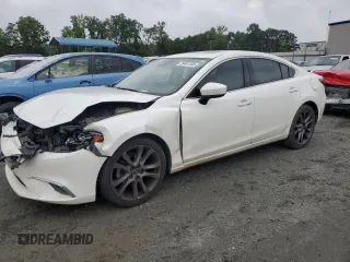 2017 Mazda 6 Grand Touring с VIN JM1GL1W50H1132437, выставлен на аукционе Copart как лот 59487495 с пробегом 112 548 миль миль и Списание • Salvage title. История ставок и продаж доступна на DreamBid. Изображение 1.