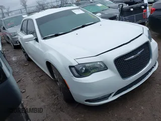 2015 Chrysler 300 with VIN 2C3CCABG9FH921565, listed as a IAAI auction lot 41737996 with 128,299 mi miles. Bid and sale history available at carsss.com. Image 1.