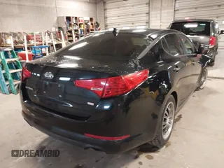2013 Kia Optima LX z VIN 5XXGM4A73DG129537, wystawiony jako IAAI lot #41884394 z przebiegiem 164 353 mil mil oraz . Historia ofert i sprzedaży dostępna na DreamBid. Obrazek 4.