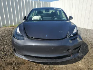 2023 Tesla Model 3 with VIN 5YJ3E1EA4PF613160, listed as a Copart auction lot 62008045 with 23,575 mi miles and Clean title. Bid and sale history available at DreamBid. Image 5.