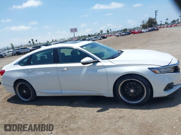 2021 Honda Accord Touring z VIN 1HGCV2F99MA007160, wystawiony jako IAAI lot #42164864 z przebiegiem 64 596 mil mil oraz . Historia ofert i sprzedaży dostępna na DreamBid. Obrazek 13.