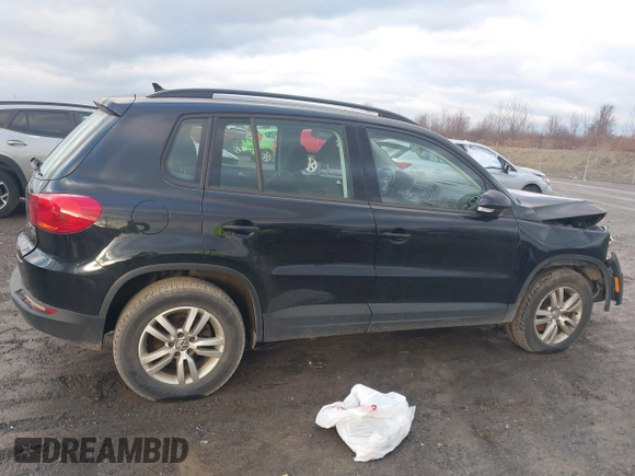 2015 Volkswagen Tiguan SE z VIN WVGBV7AXXFW612903, wystawiony jako IAAI lot #41017461 z przebiegiem 149 297 mil mil oraz . Historia ofert i sprzedaży dostępna na DreamBid. Obrazek 14.
