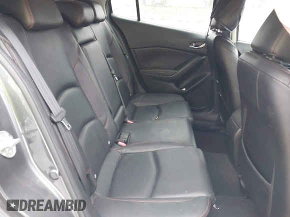 2014 Mazda 3 S Touring with VIN JM1BM1L30E1200337, listed as a IAAI auction lot 41906333 with 92,873 mi miles and . Bid and sale history available at DreamBid. Image 8.