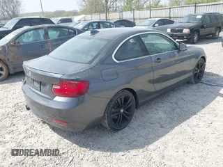 2016 BMW 2 Series 228i xDrive with VIN WBA1G9C59GV599731, listed as a IAAI auction lot 42074240 with 70,872 mi miles and . Bid and sale history available at DreamBid. Image 4.
